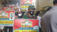 Babinsa Koramil 02/TB Bagikan Masker Dalam Kegiatan Sosialisasi PPKM