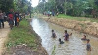 Kapolsek Pantee Bidari Turun Langsung Bantu Mencari Dan Evakuasi Bocah Tenggelam di Saluran Irigasi