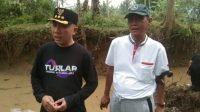 Bupati way Kanan Bersama polres dan TNI Bersihkan Aliran Sungai Asun