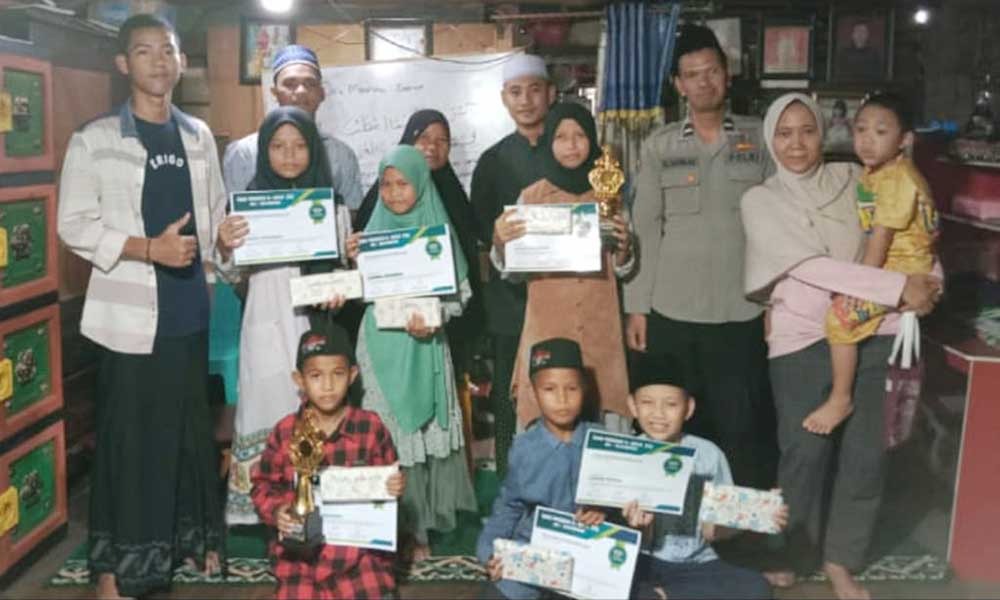 Polisi Baik Aipda M. Aliudin, S.H. Adakan Lomba Azan di TPQ Al-Hikmah