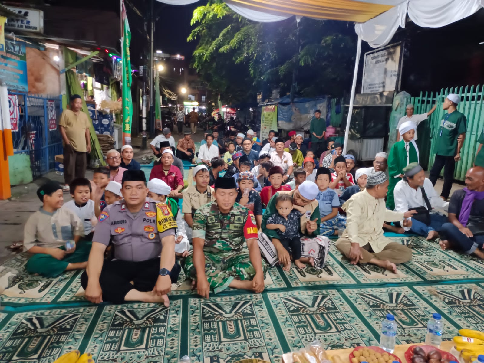 Babinsa Sertu Rusnanto Hadiri Peringatan Isra Mi’raj di Masjid Assyaffi”yyah