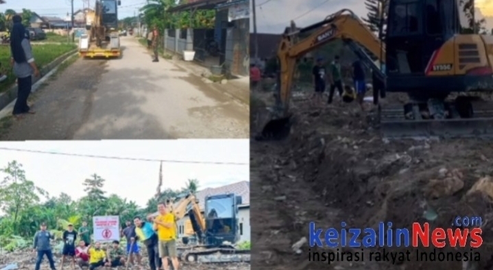 Lurah Wua-Wua Gerakkan Warga Sekitar Benahi Jalan Rusak di Lorong Durian Gunakan Alat berat Mini