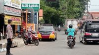 Pastikan Keselamatan Pengguna Jalan, Aipda Mulani dan Aipda Ujang Sujana Laksanakan Gatur Lantas